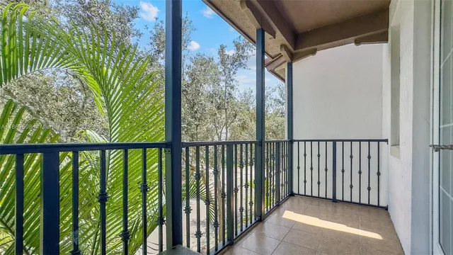 a view of a balcony with chair