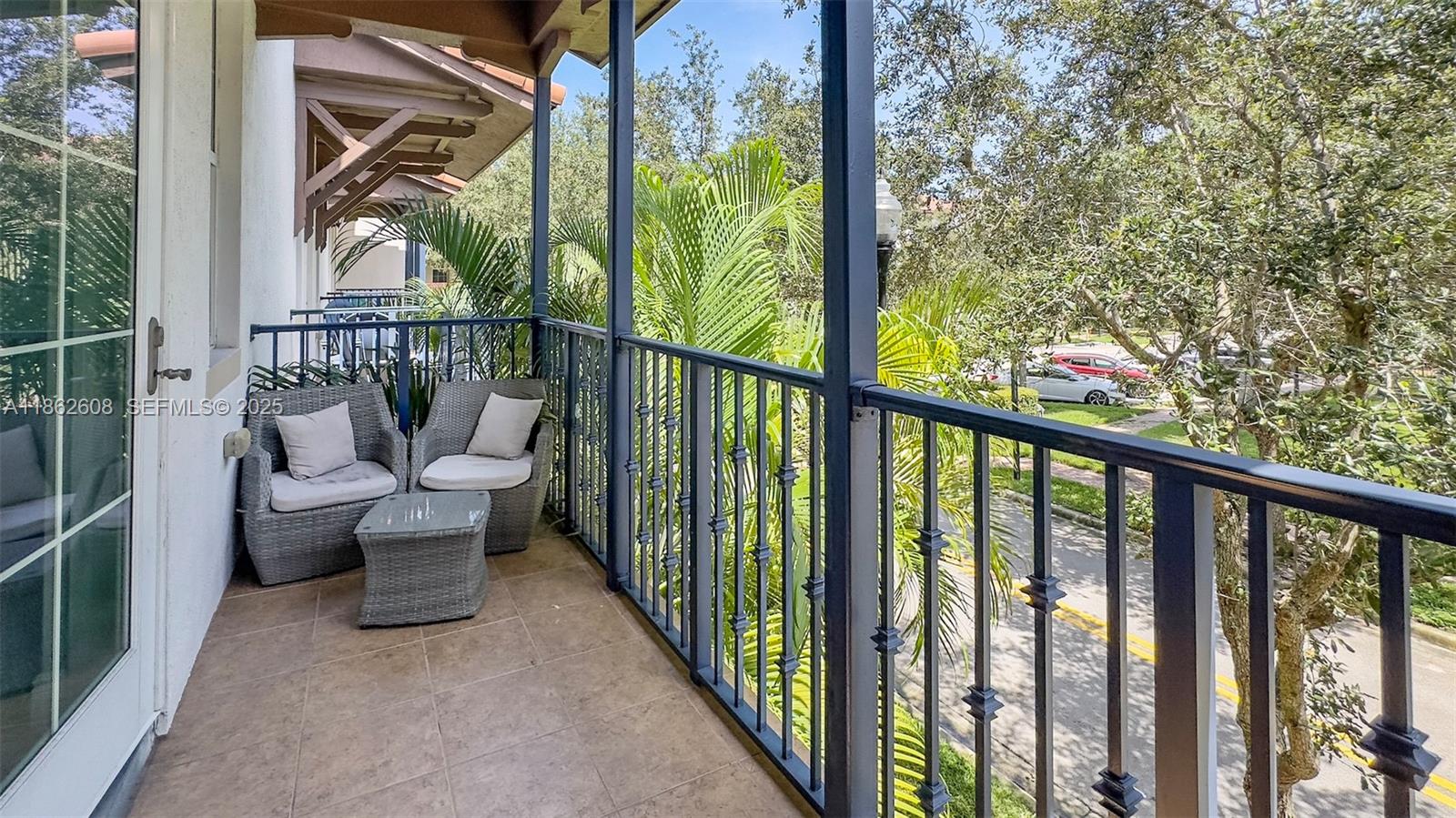 2547 Southwest 119th Terrace Miramar, FL 33025 - Photo 18 of 41 a view of a balcony with chair