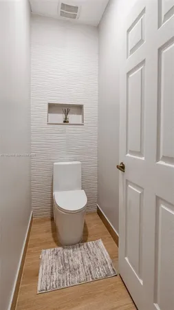 a bathroom with a toilet