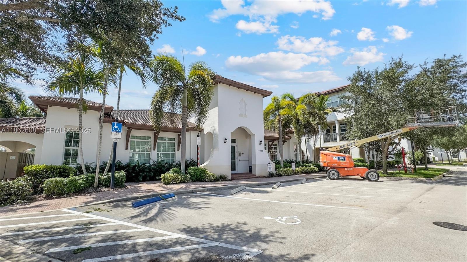 2547 Southwest 119th Terrace Miramar, FL 33025 - Photo 32 of 41 a parked cars parked in front of a house