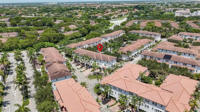 an aerial view of a city with lake view