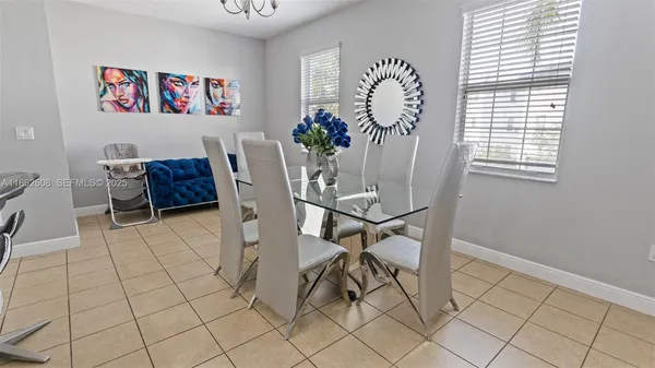 a workspace with furniture and window