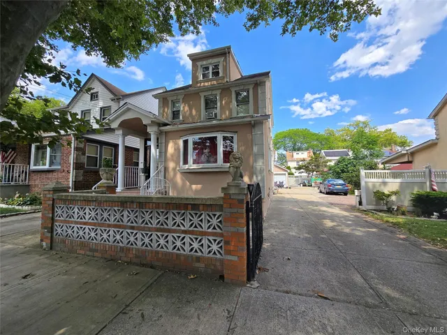 a view of a house with a street