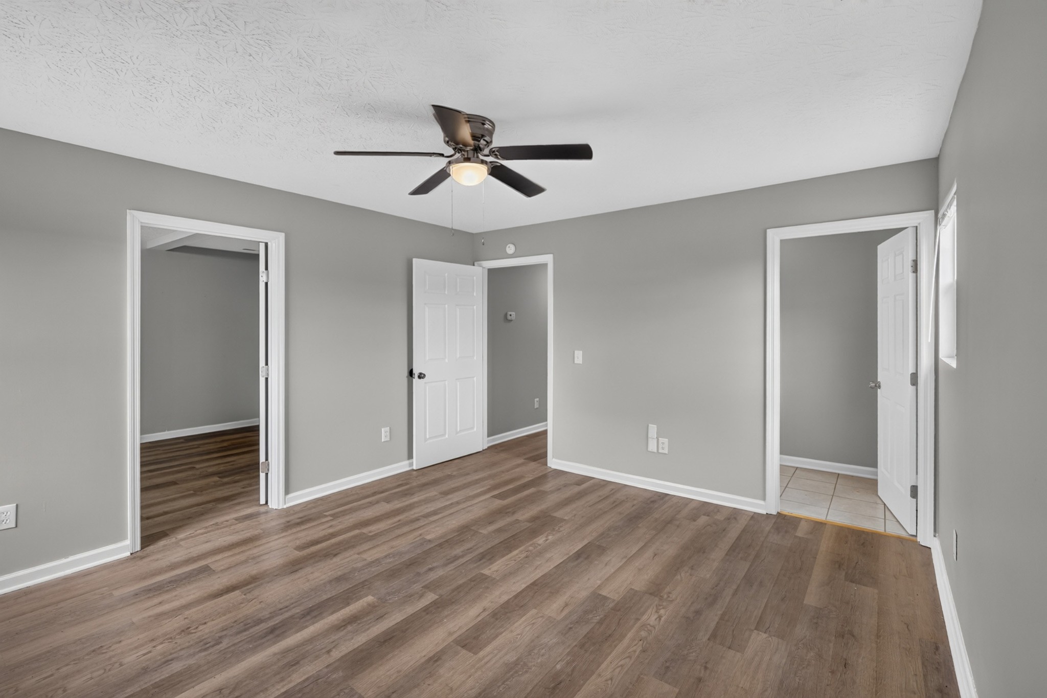 120 Driver Road Lafayette, TN 37083 - Photo 15 of 39 a view of empty room with wooden floor and window