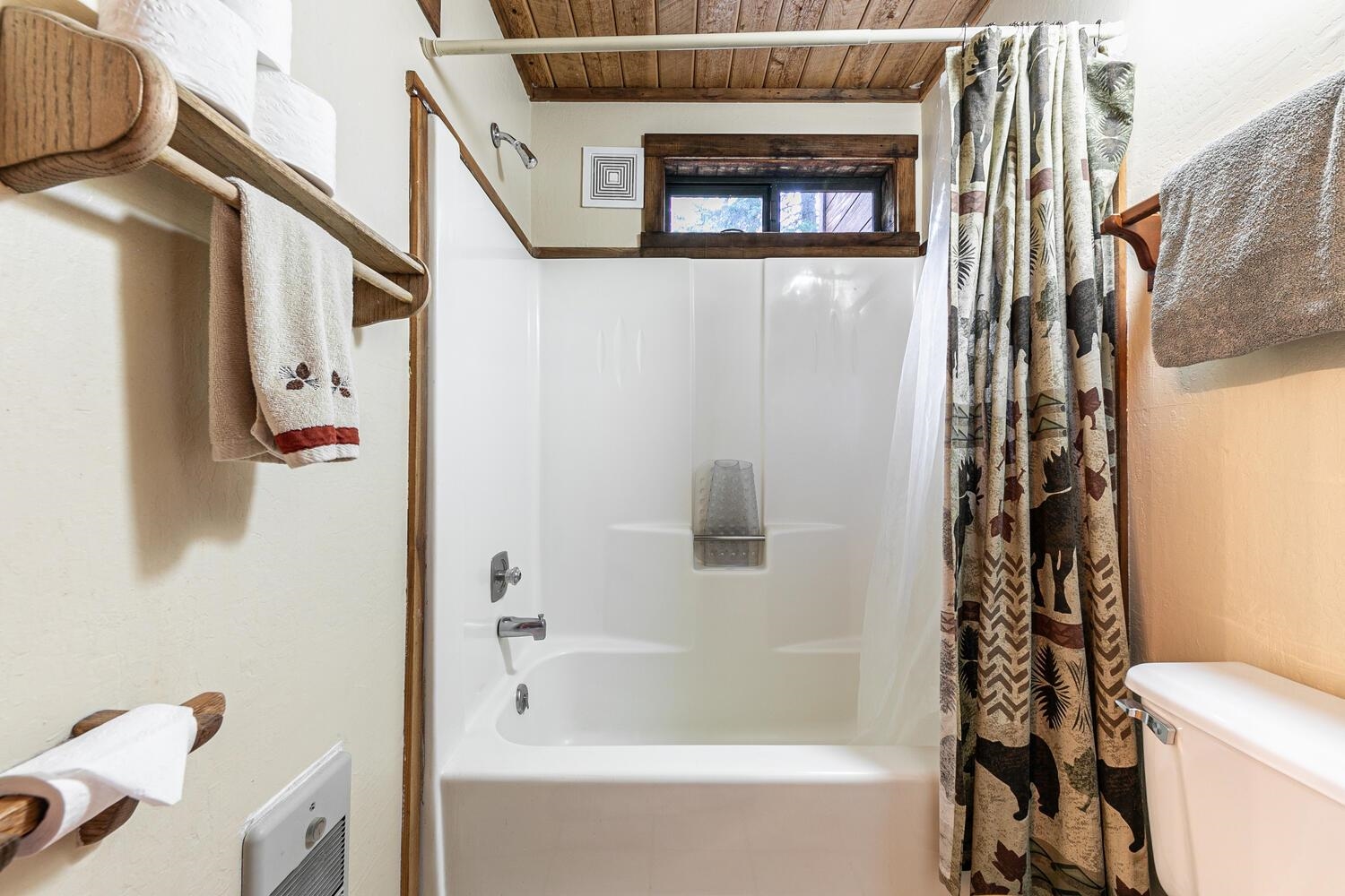 1786 Trapper Place Alpine Meadows, CA 96146 - Photo 12 of 16 a bathroom with a bathtub and shower