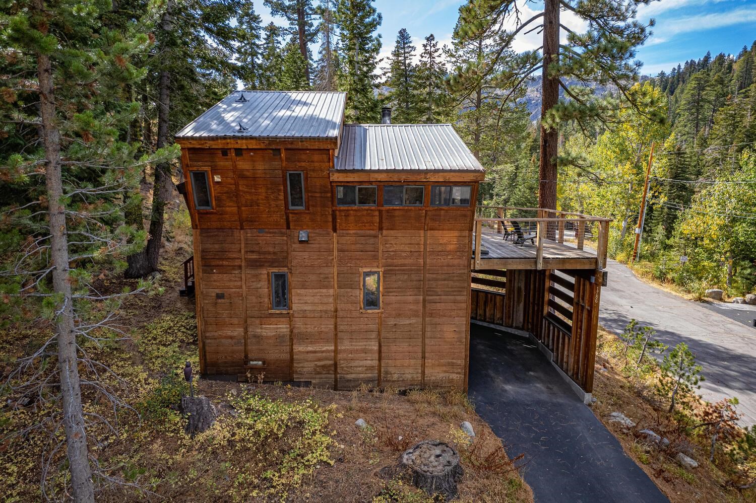 1786 Trapper Place Alpine Meadows, CA 96146 - Photo 3 of 16 a view of a house next to a yard