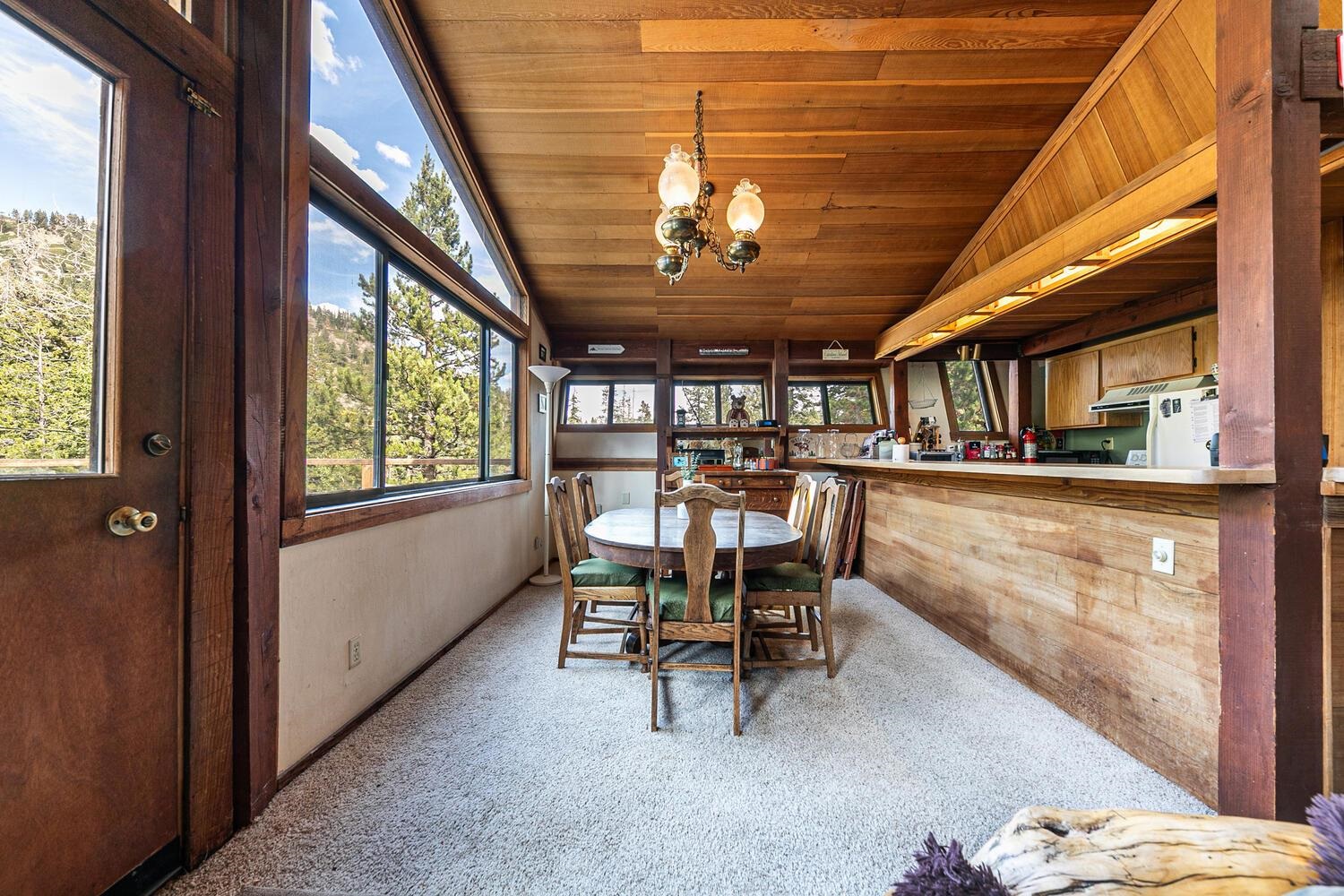 1786 Trapper Place Alpine Meadows, CA 96146 - Photo 5 of 16 a view of a dining room with furniture window and outside view