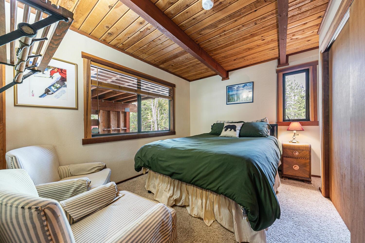 1786 Trapper Place Alpine Meadows, CA 96146 - Photo 7 of 16 a bedroom with a bed couch and window