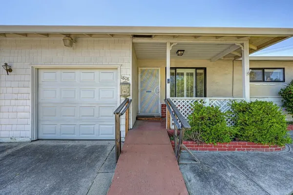 front view of a house with an empty space