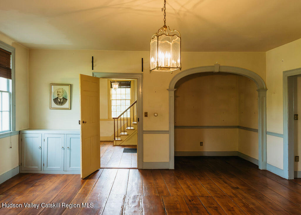 652 Albany Post Road New Paltz, NY 12561 - Photo 14 of 36 a view of empty room with wooden floor