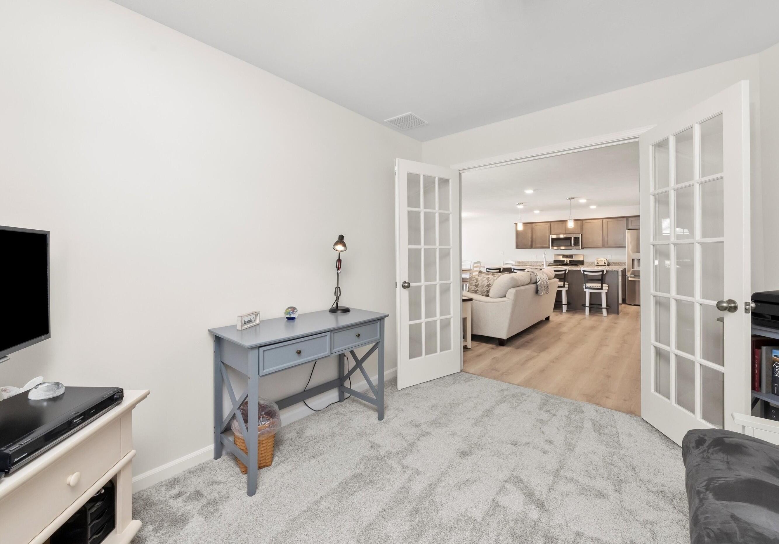 13665 Freedom Way Cedar Lake, IN 46303 - Photo 11 of 23 a living room with furniture and a flat screen tv