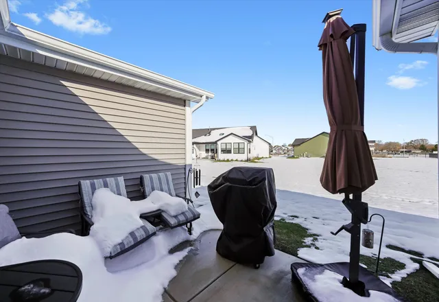 a front view of a house with patio