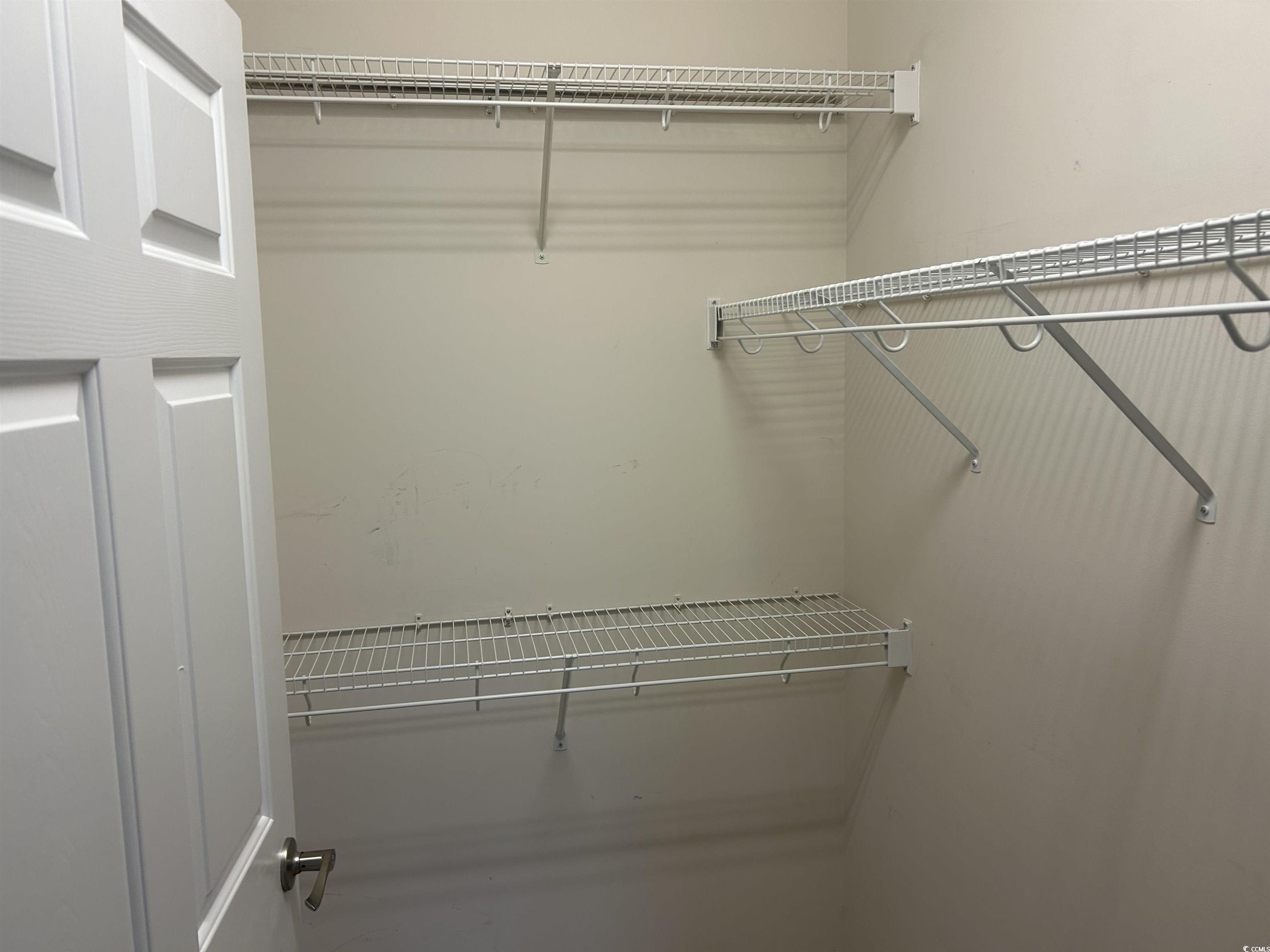 4104 Pinehurst Circle, Unit 2G Little River, SC 29566 - Photo 15 of 17 View of spacious closet