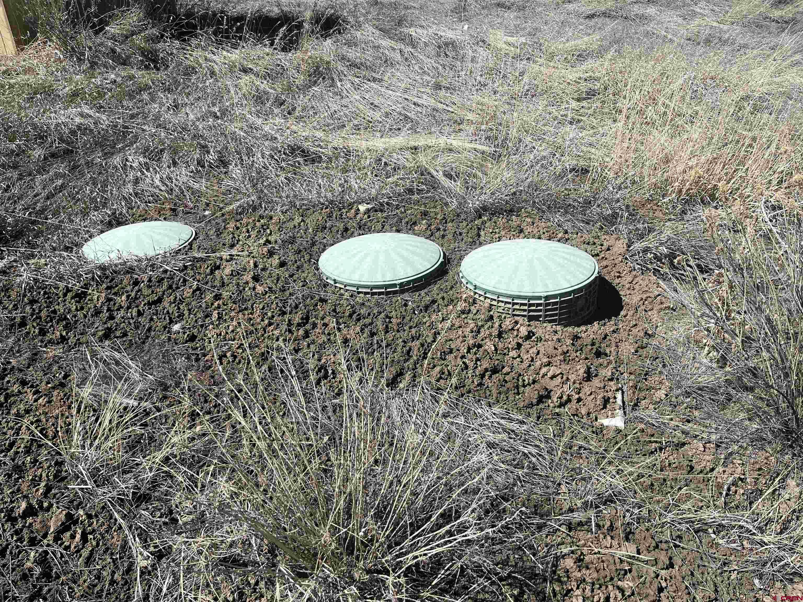 203 Lion Road Durango, CO 81303 - Photo 13 of 22 a view of a bathroom with a sink and a mirror