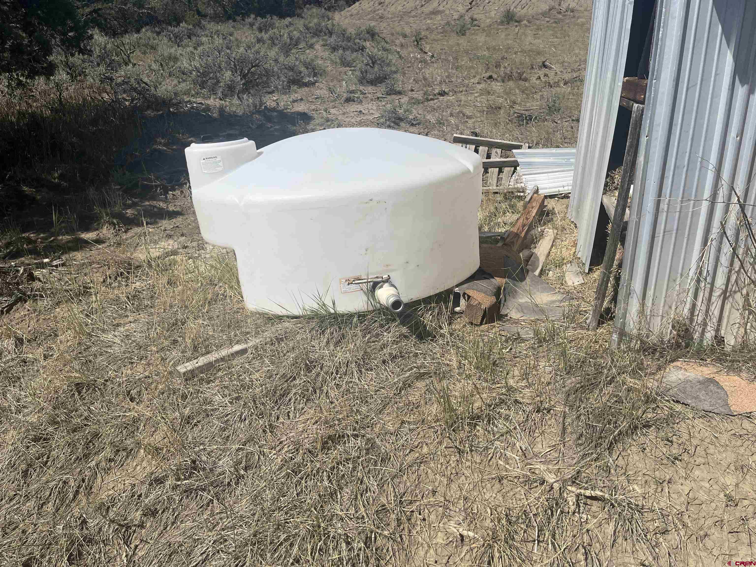 203 Lion Road Durango, CO 81303 - Photo 21 of 22 a white bath tub sitting in a backyard