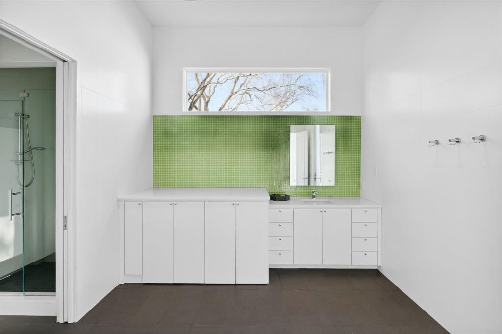 11565 East Ricks Circle Dallas, TX 75230 - Photo 32 of 39 Downstairs pool bath and utility room