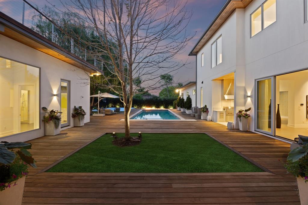 11565 East Ricks Circle Dallas, TX 75230 - Photo 34 of 39 Expansive wood deck off of covered loggia with pool