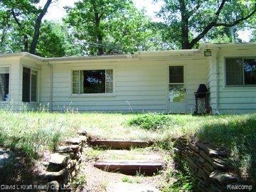 7442 Port Austin Road Caseville, MI 48725 - Photo 5 of 20 7442PtAustinRdBack