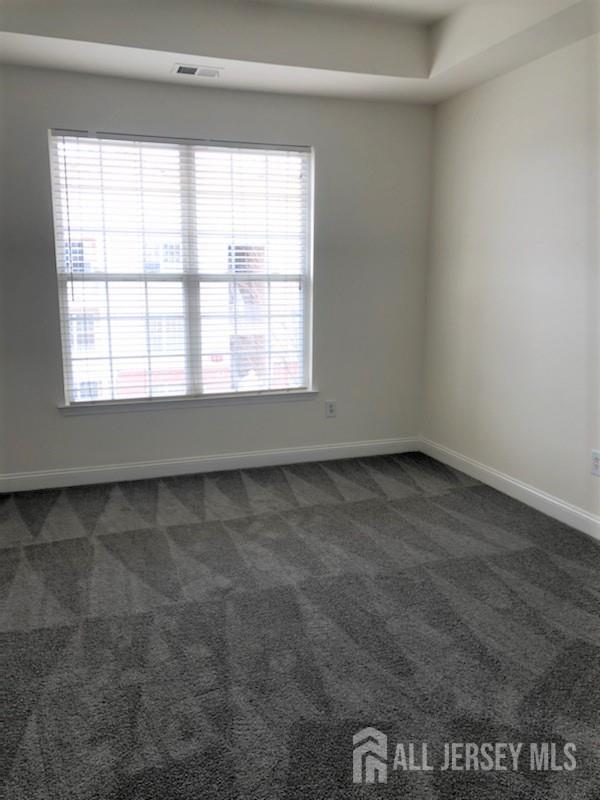 244 Samuel Circle Parlin, NJ 08859 - Photo 6 of 14 an empty room with a window