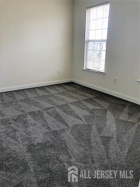 244 Samuel Circle Parlin, NJ 08859 - Photo 7 of 14 an empty room with a window