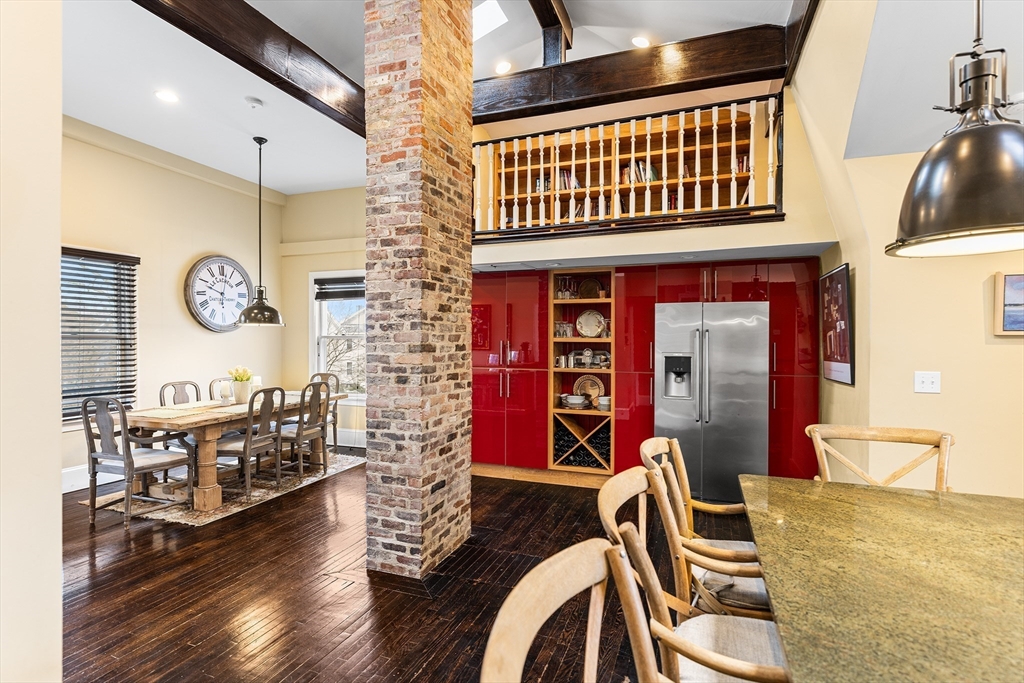 405 Cherry Street, Unit 2 Newton, MA 02465 - Photo 13 of 39 a dining room with furniture and wooden floor