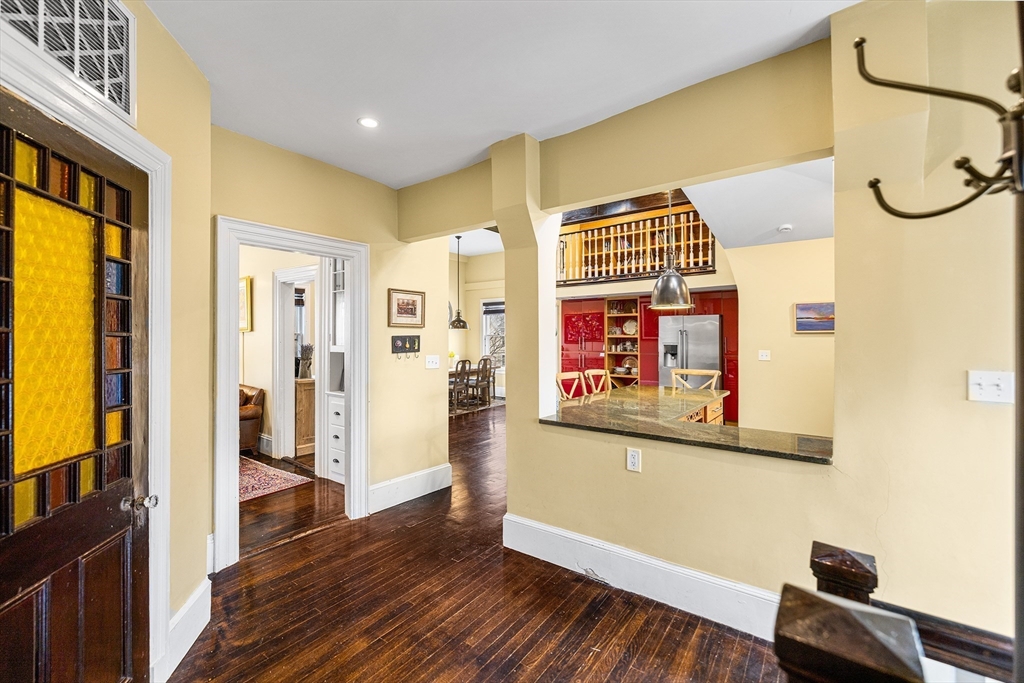 405 Cherry Street, Unit 2 Newton, MA 02465 - Photo 14 of 39 a view of a hallway with wooden floor and staircase