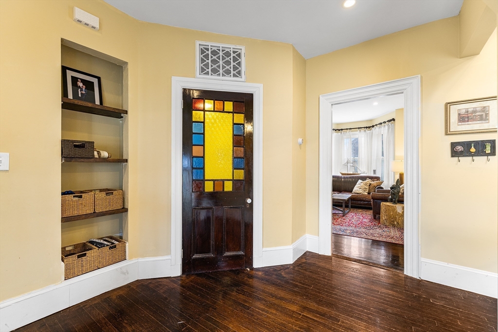 405 Cherry Street, Unit 2 Newton, MA 02465 - Photo 16 of 39 a view of a living room and a wooden floor