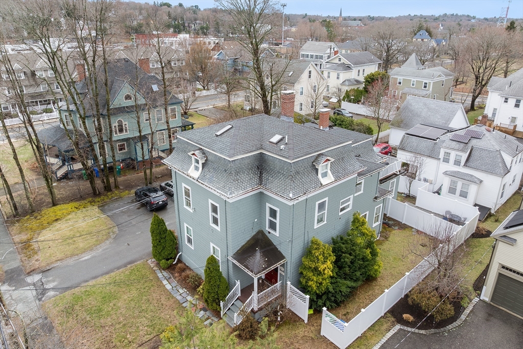 405 Cherry Street, Unit 2 Newton, MA 02465 - Photo 2 of 39 an aerial view of a house with a garden