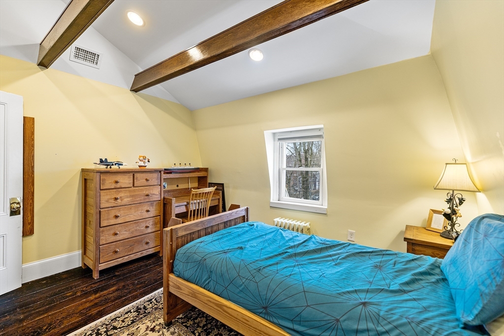 405 Cherry Street, Unit 2 Newton, MA 02465 - Photo 29 of 39 a bedroom with a bed and a closet