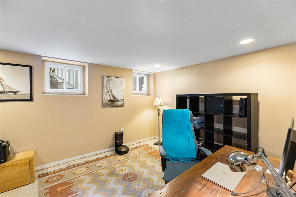 405 Cherry Street, Unit 2 Newton, MA 02465 - Photo 32 of 39 a view of a livingroom with furniture and closet