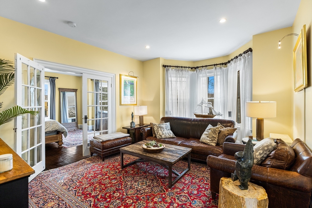 405 Cherry Street, Unit 2 Newton, MA 02465 - Photo 6 of 39 a living room with furniture and a couch