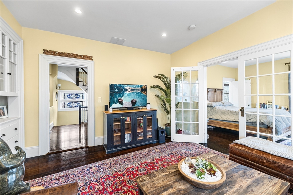 405 Cherry Street, Unit 2 Newton, MA 02465 - Photo 7 of 39 a living room with furniture and a fireplace