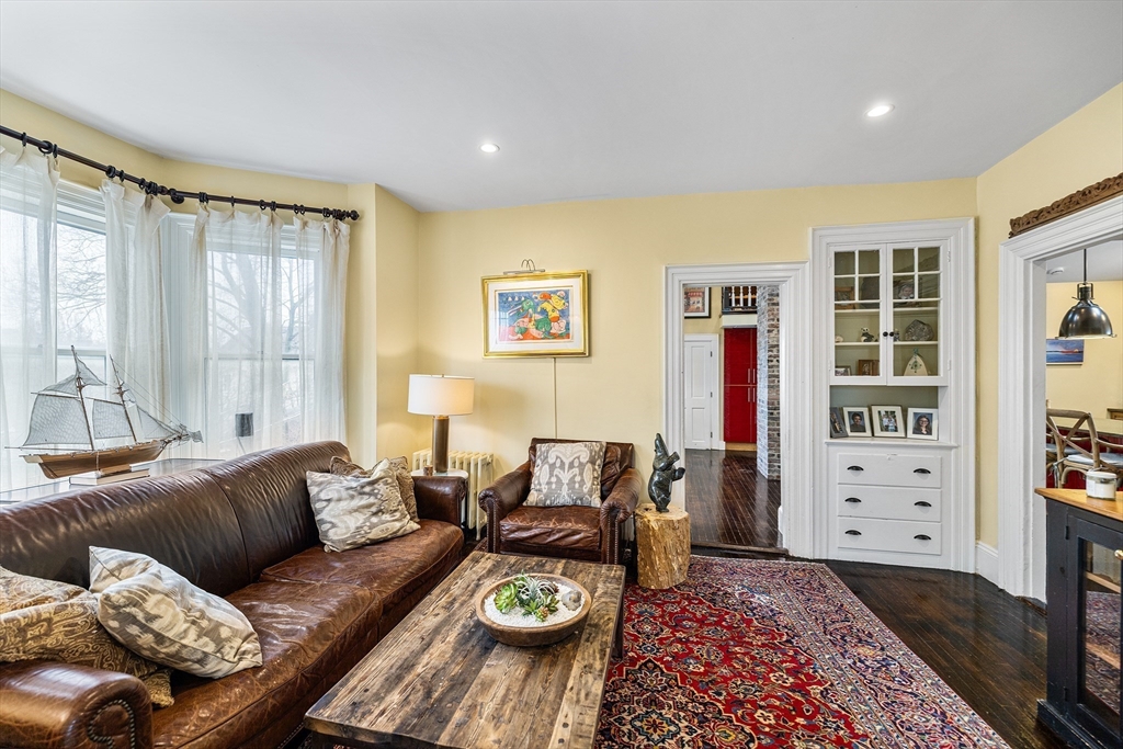 405 Cherry Street, Unit 2 Newton, MA 02465 - Photo 8 of 39 a living room with furniture and a rug