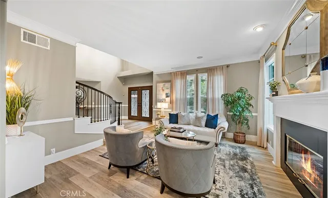 a kitchen with white cabinets and appliances