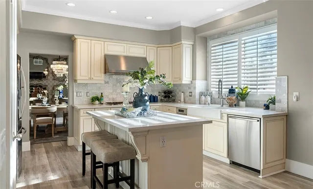 a living room with fireplace furniture and a flat screen tv