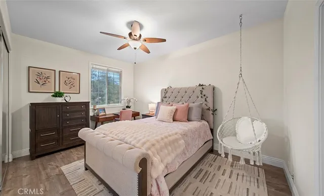 a view of a patio with a table and chairs