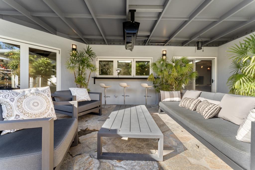 Undisclosed Address Stanford, CA 94305 - Photo 12 of 45 a living room with furniture and a large window