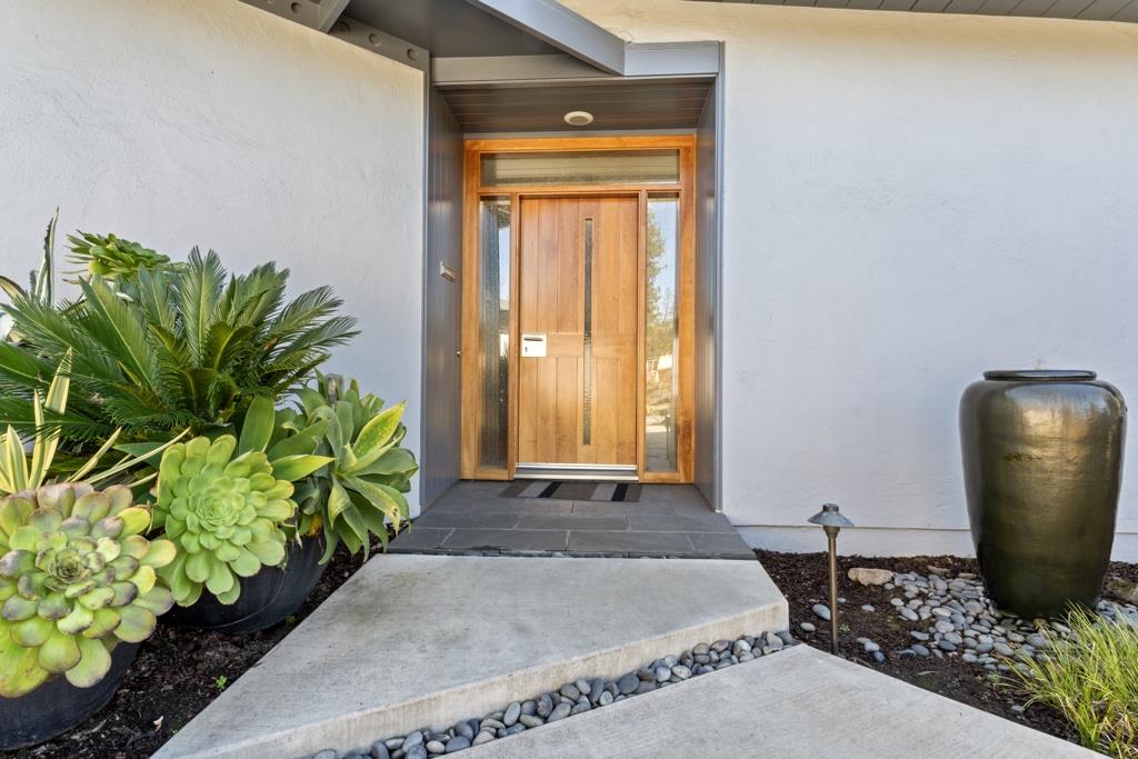 Undisclosed Address Stanford, CA 94305 - Photo 13 of 45 a room with painting and a potted plant