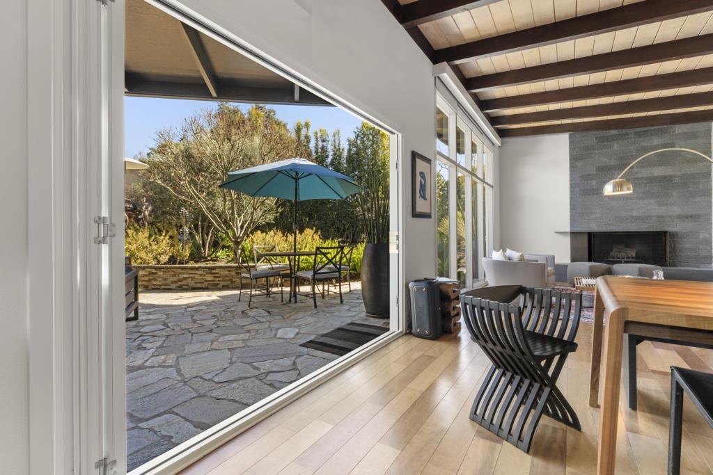 Undisclosed Address Stanford, CA 94305 - Photo 20 of 45 a view of a dining room with furniture and chandelier