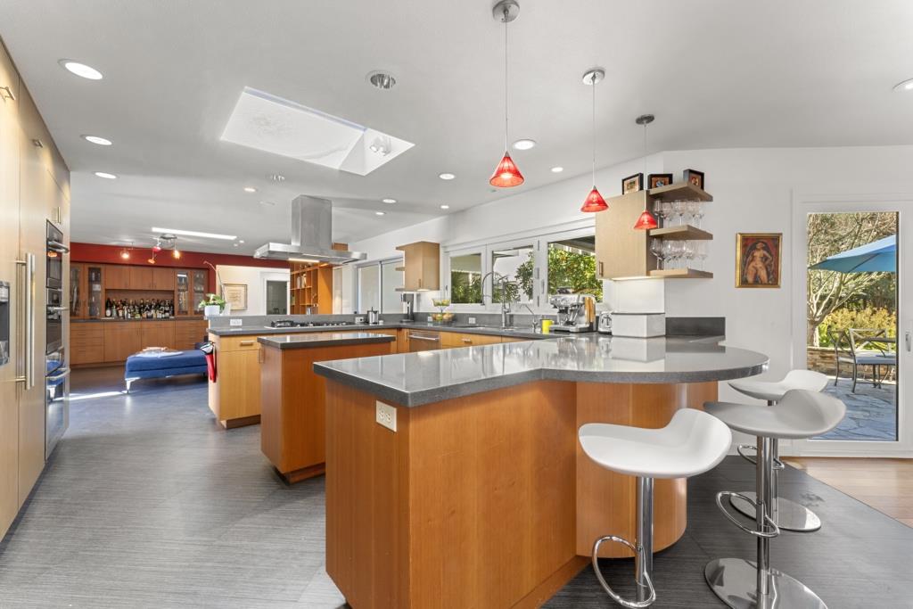 Undisclosed Address Stanford, CA 94305 - Photo 22 of 45 a kitchen with granite countertop counter space dining table and chairs