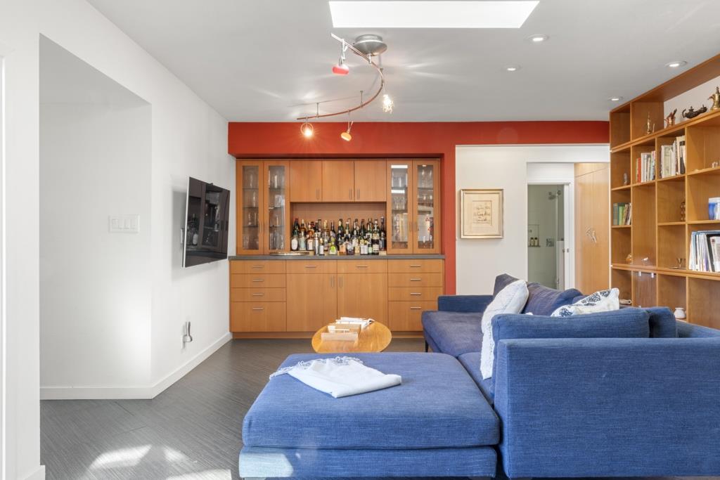 Undisclosed Address Stanford, CA 94305 - Photo 26 of 45 a living room with furniture and a large window