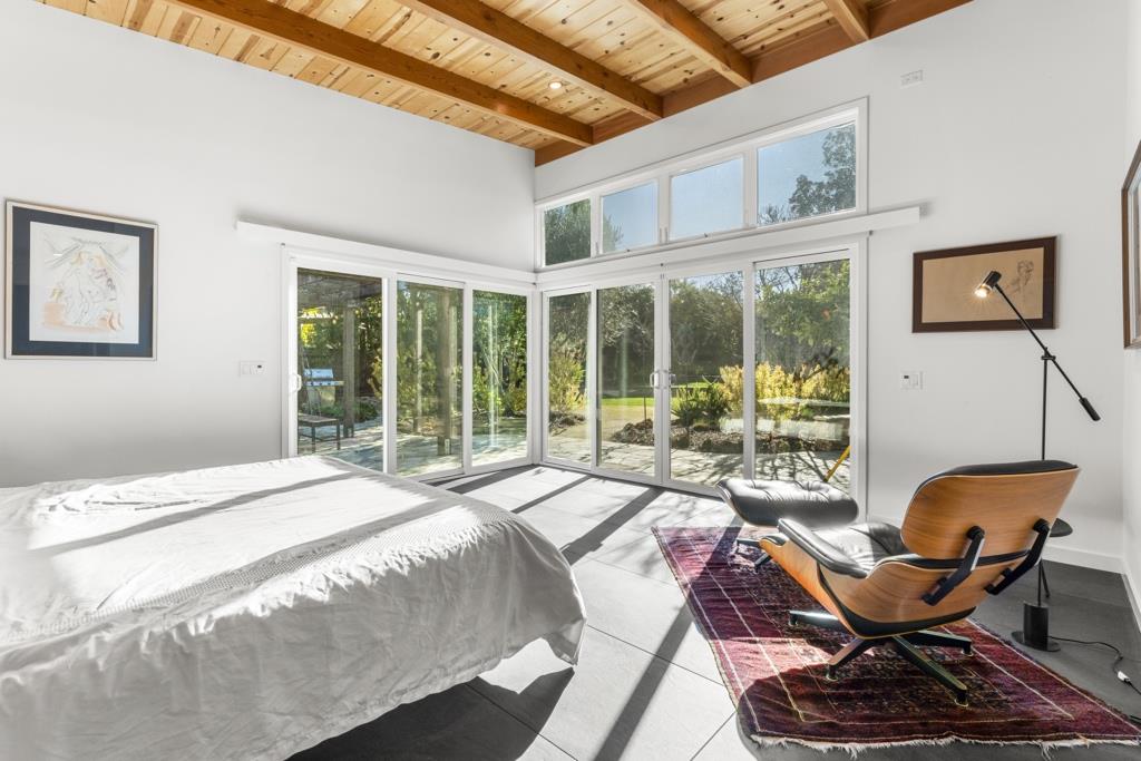 Undisclosed Address Stanford, CA 94305 - Photo 29 of 45 a bed sitting in a bedroom next to a window