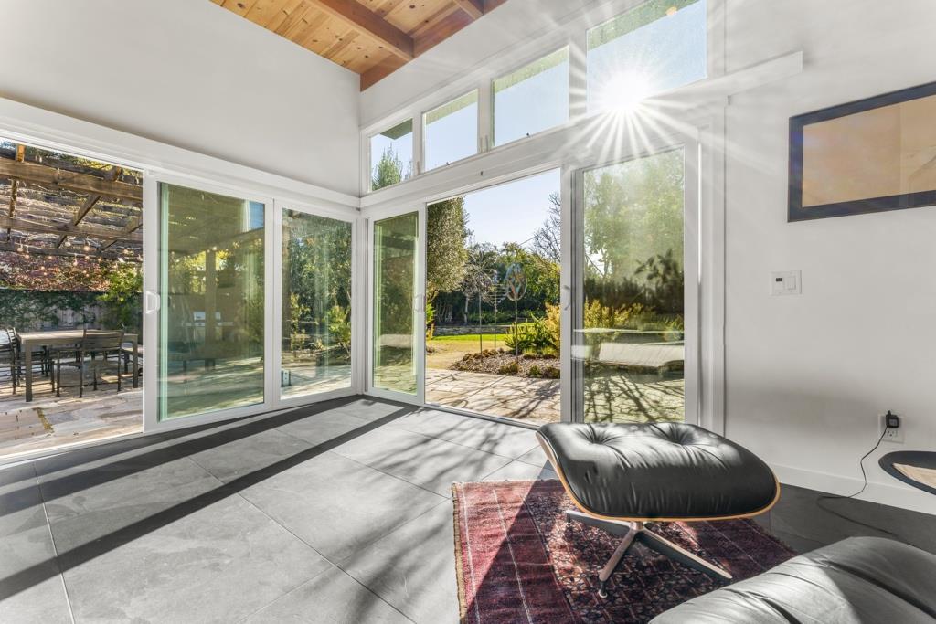 Undisclosed Address Stanford, CA 94305 - Photo 30 of 45 a room with a bed and glass door