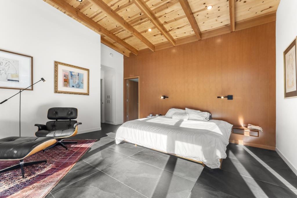 Undisclosed Address Stanford, CA 94305 - Photo 31 of 45 a bedroom with a bed and wooden floor