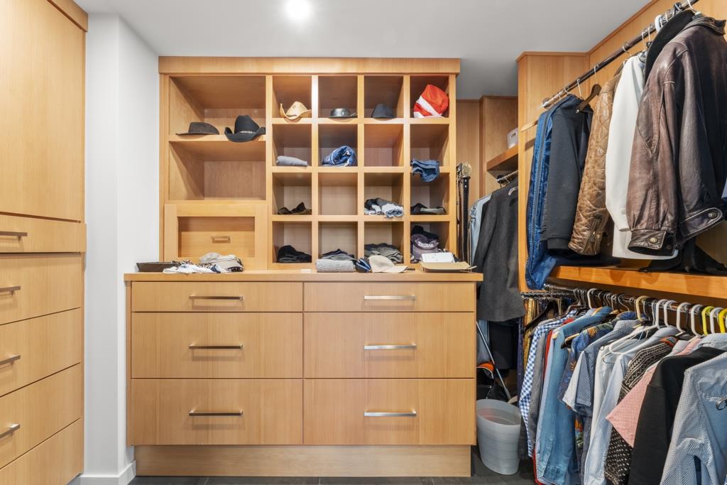 Undisclosed Address Stanford, CA 94305 - Photo 36 of 45 a view of walk in closet with clothes and shoes