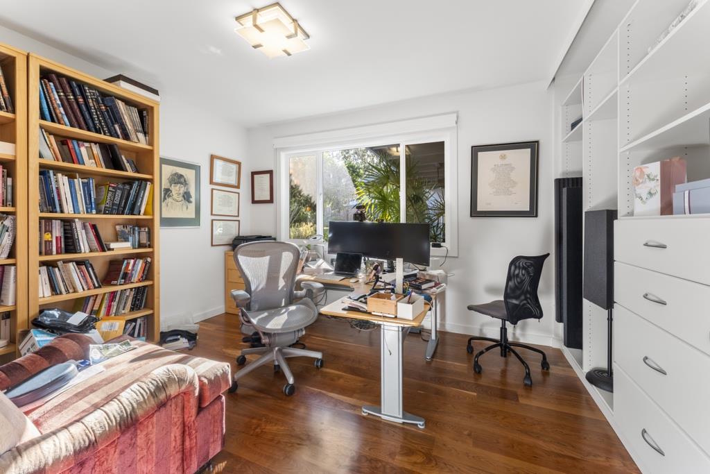 Undisclosed Address Stanford, CA 94305 - Photo 37 of 45 a view of a workspace with furniture and a bookshelf