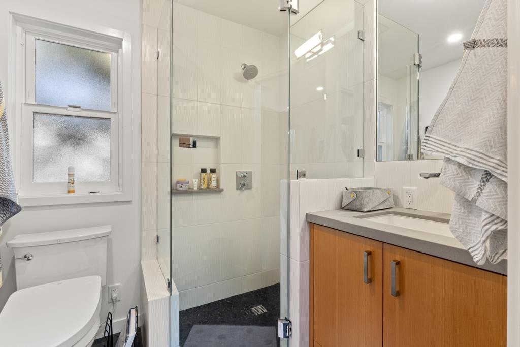 Undisclosed Address Stanford, CA 94305 - Photo 40 of 45 a bathroom with a granite countertop sink toilet and shower