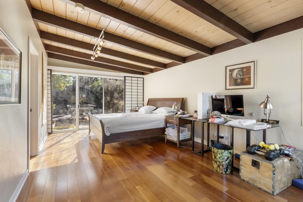 Undisclosed Address Stanford, CA 94305 - Photo 43 of 45 a bedroom with furniture and a wooden floor