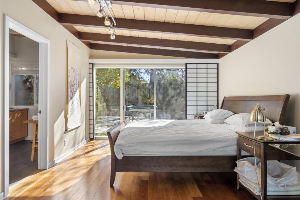 Undisclosed Address Stanford, CA 94305 - Photo 44 of 45 a bedroom with a bed and wooden floor