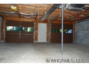4 Edna Oaks Road Hendersonville, NC 28792 - Photo 18 of 19 a view of a room with wooden floor
